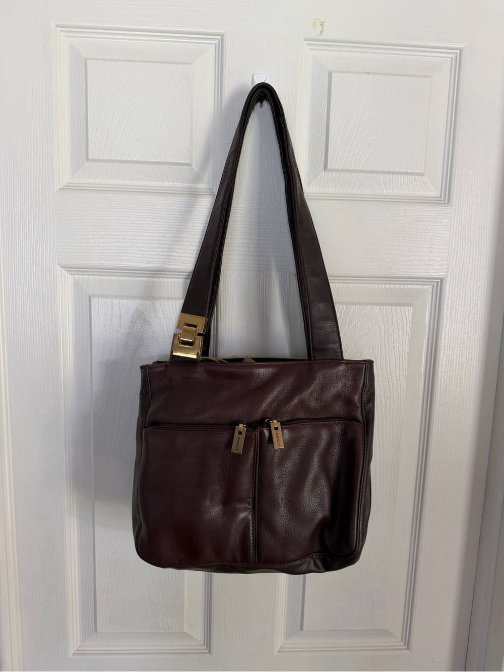 Aurielle Vtg Black Leather Shoulder Bag
6 Zipper Pockets